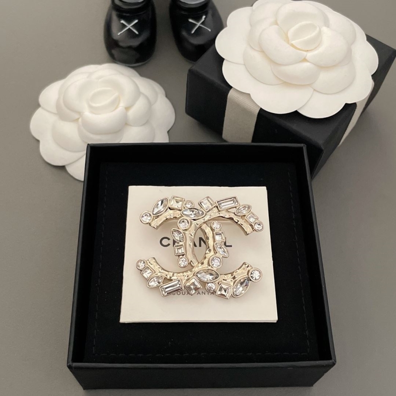 Ch*el brooches
